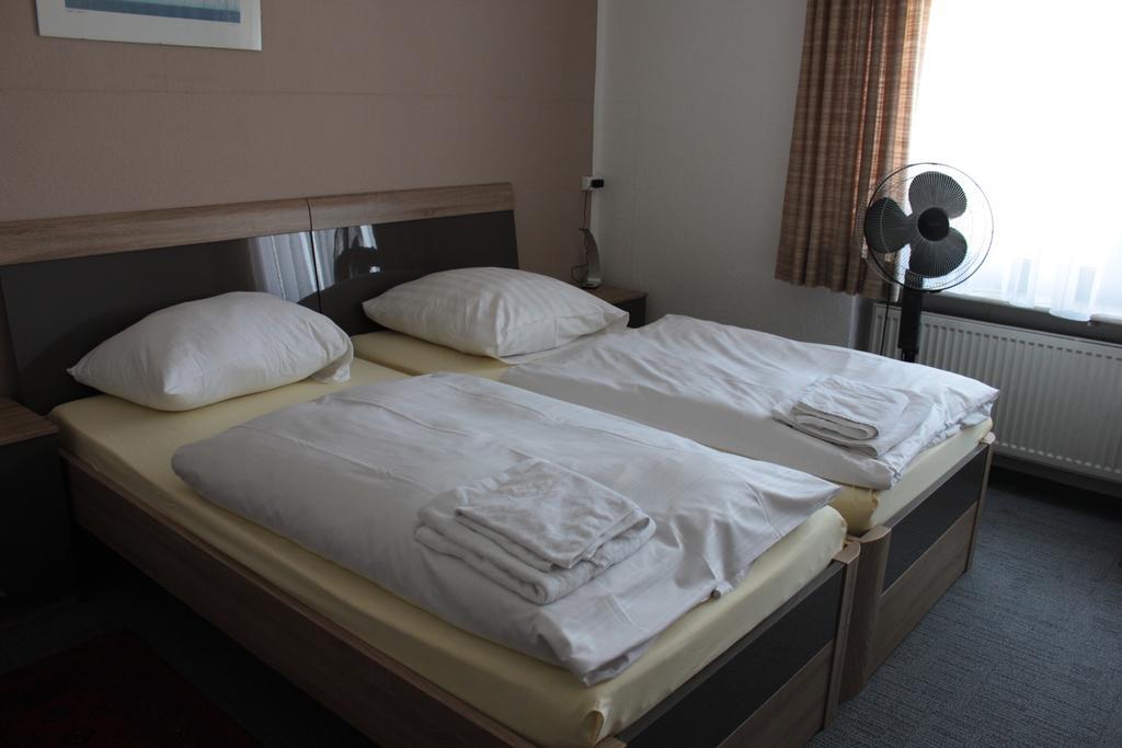 Airport-Hotel Zum Taubengrund Кельстербах Номер фото