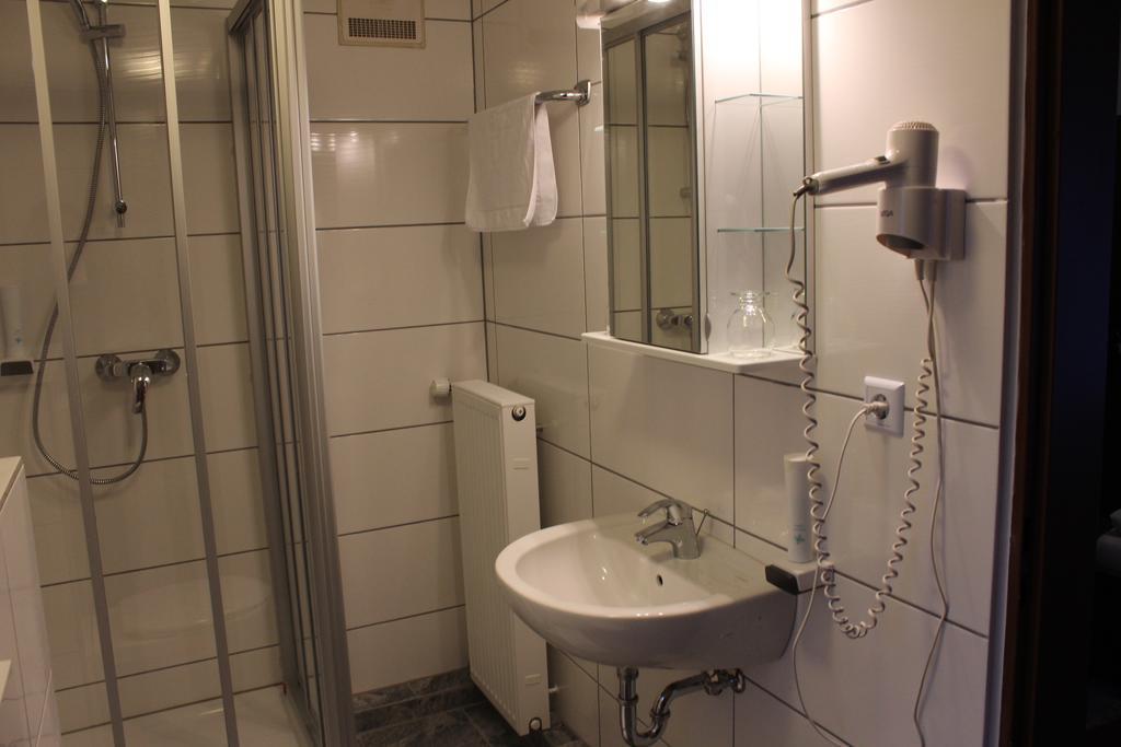 Airport-Hotel Zum Taubengrund Кельстербах Номер фото